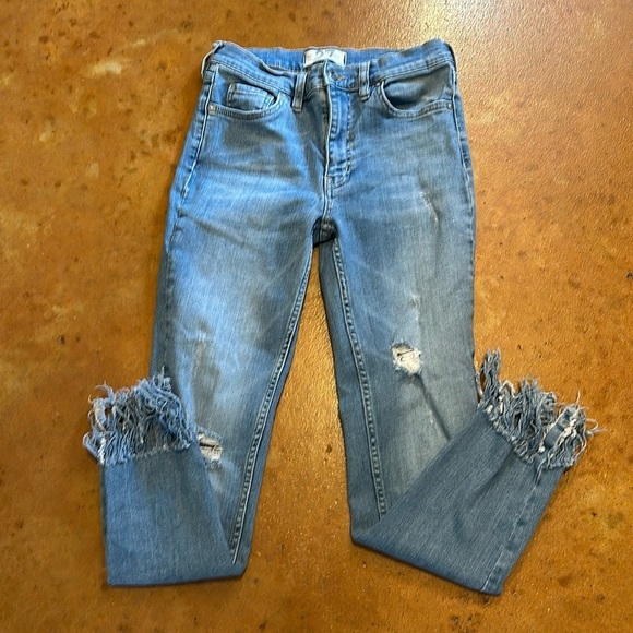 We The Free distressed and fringe hem Jean. Size 27. Waist flat 13”. Rise 9”. - Picture 1 of 8